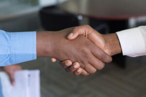 A professional cemetery broker assisting a client in selecting a burial plot