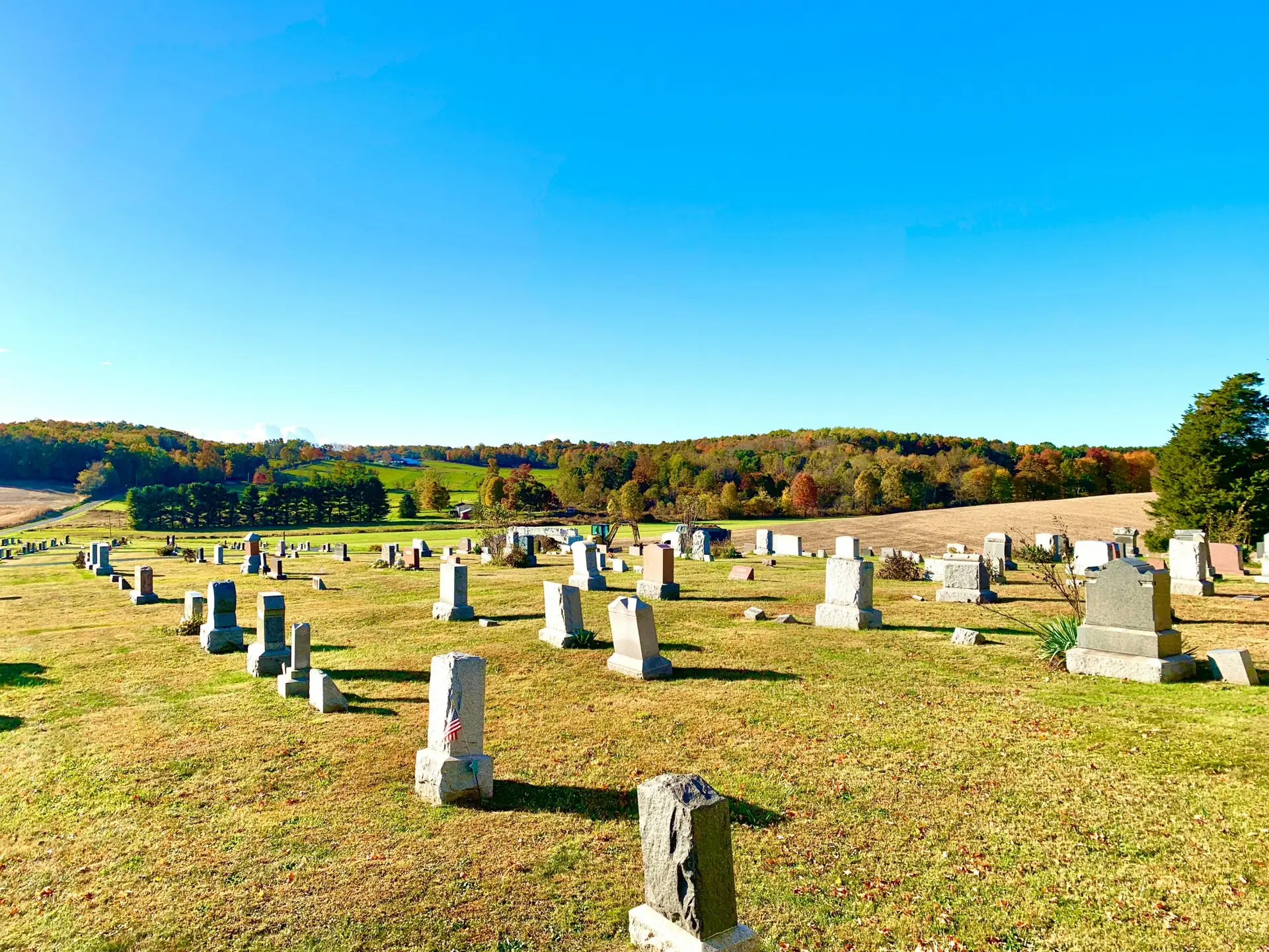 Traditional grave with a headstone in a cemetery